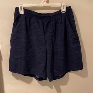 Lululemon Men’s navy 7” Liner-Less Shorts